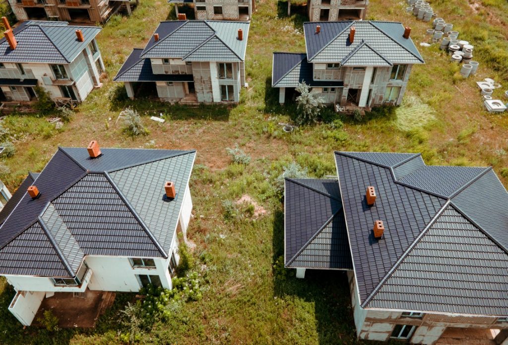 aerial view of abandoned houses following the real estate crisis. top view